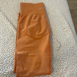 Nvgtn yoga pants orange like new